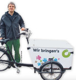 Mit dem Lastenfahrrad Einkäufe nach Hause bringen, auch eine Idee, die das Standing bei Kunden verbessern kann.